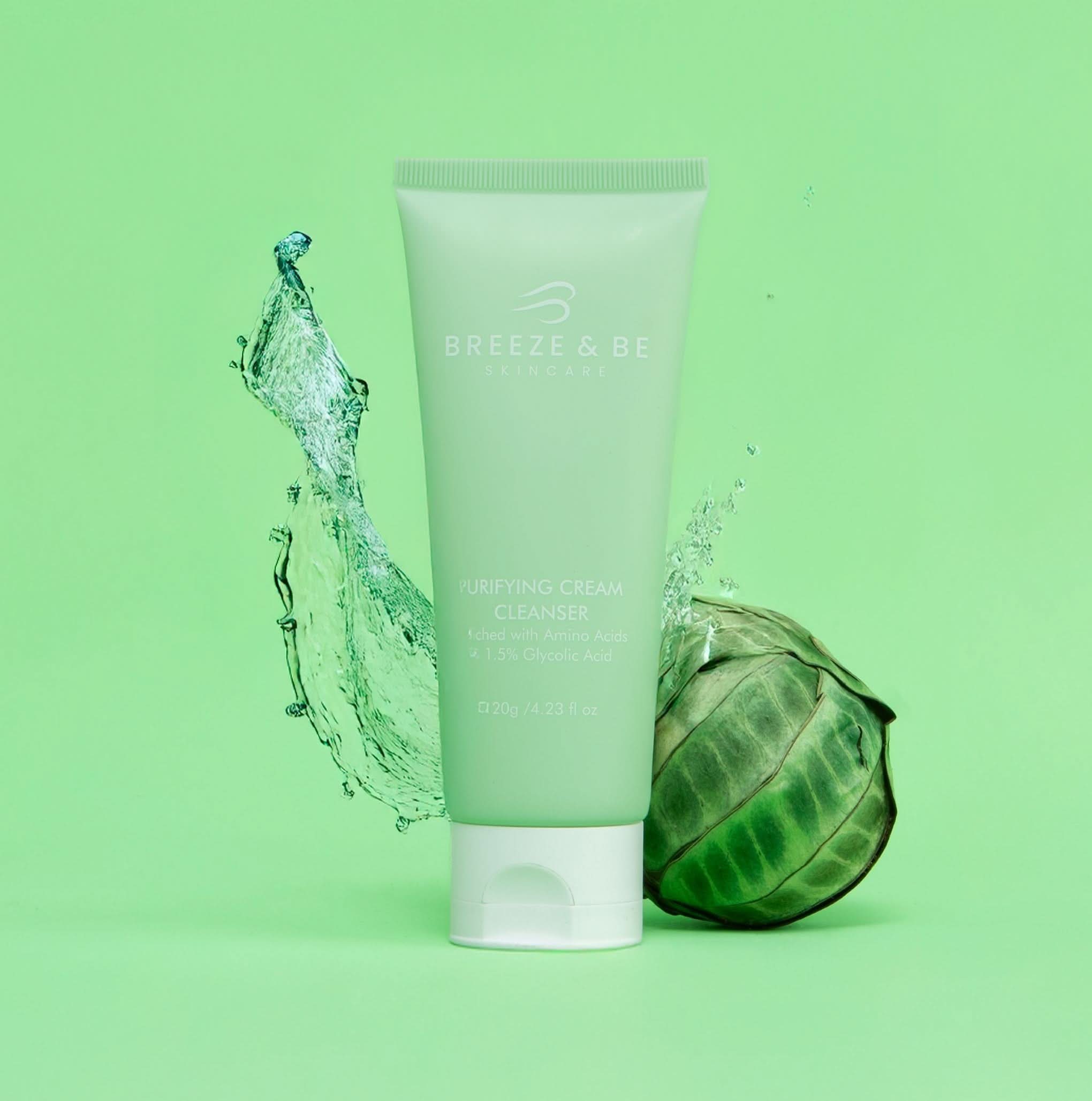 Tube of Breeze & Be cream cleanser with a water droplet and leaf on a green background