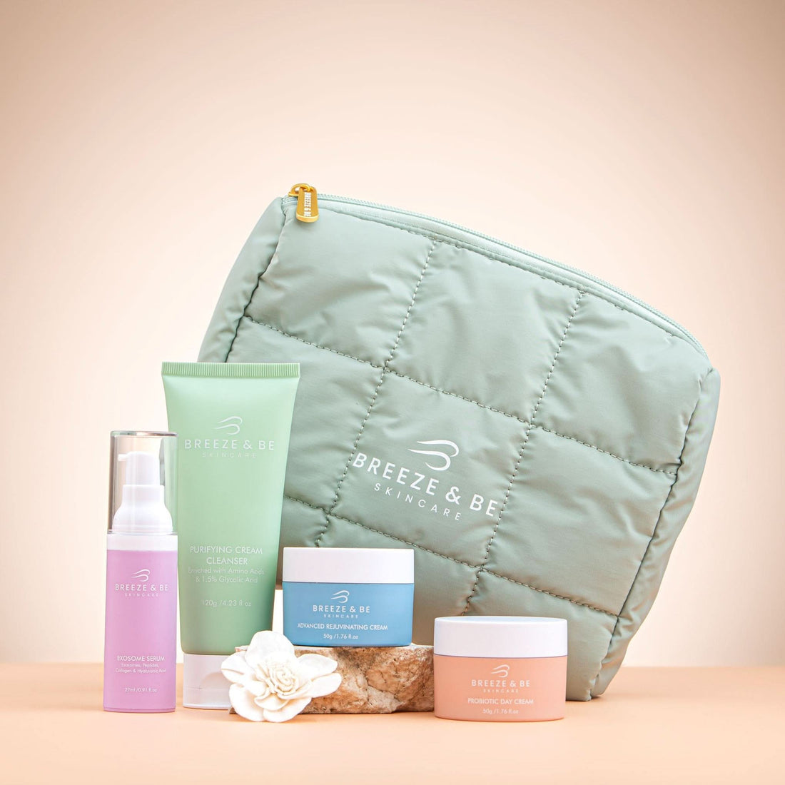 Breeze &amp; Be skincare products including a pouch on a beige background